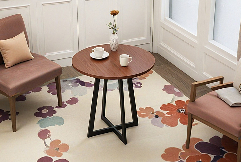 Coffee table with a wooden tabletop in a cozy living room scene, showcasing DELTA CAINA's furniture hardware solutions. Combining modern aesthetics with durable materials for stylish interiors.